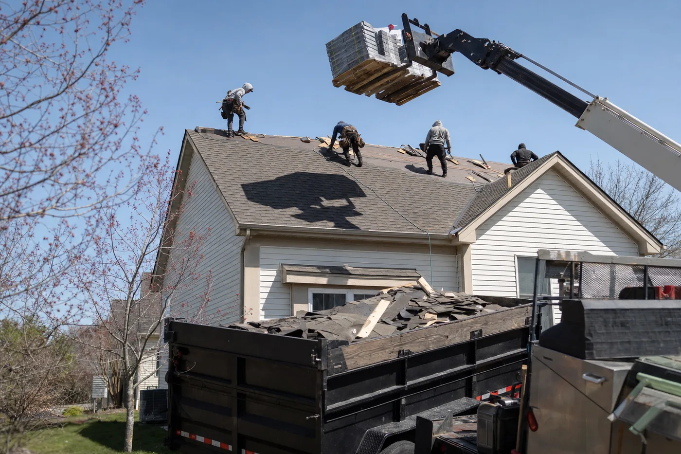 roofing companies at work
